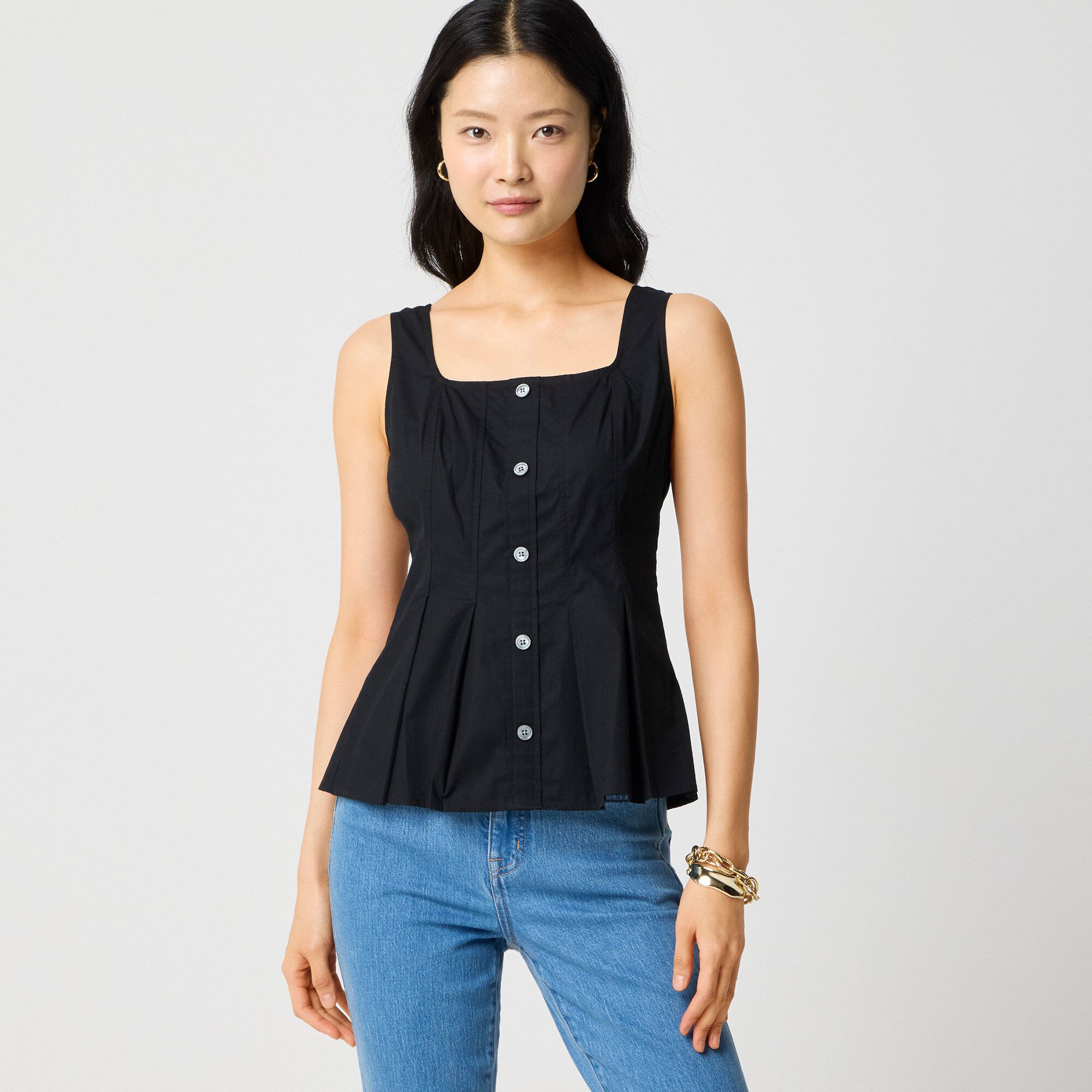 Sleeveless button-up peplum top