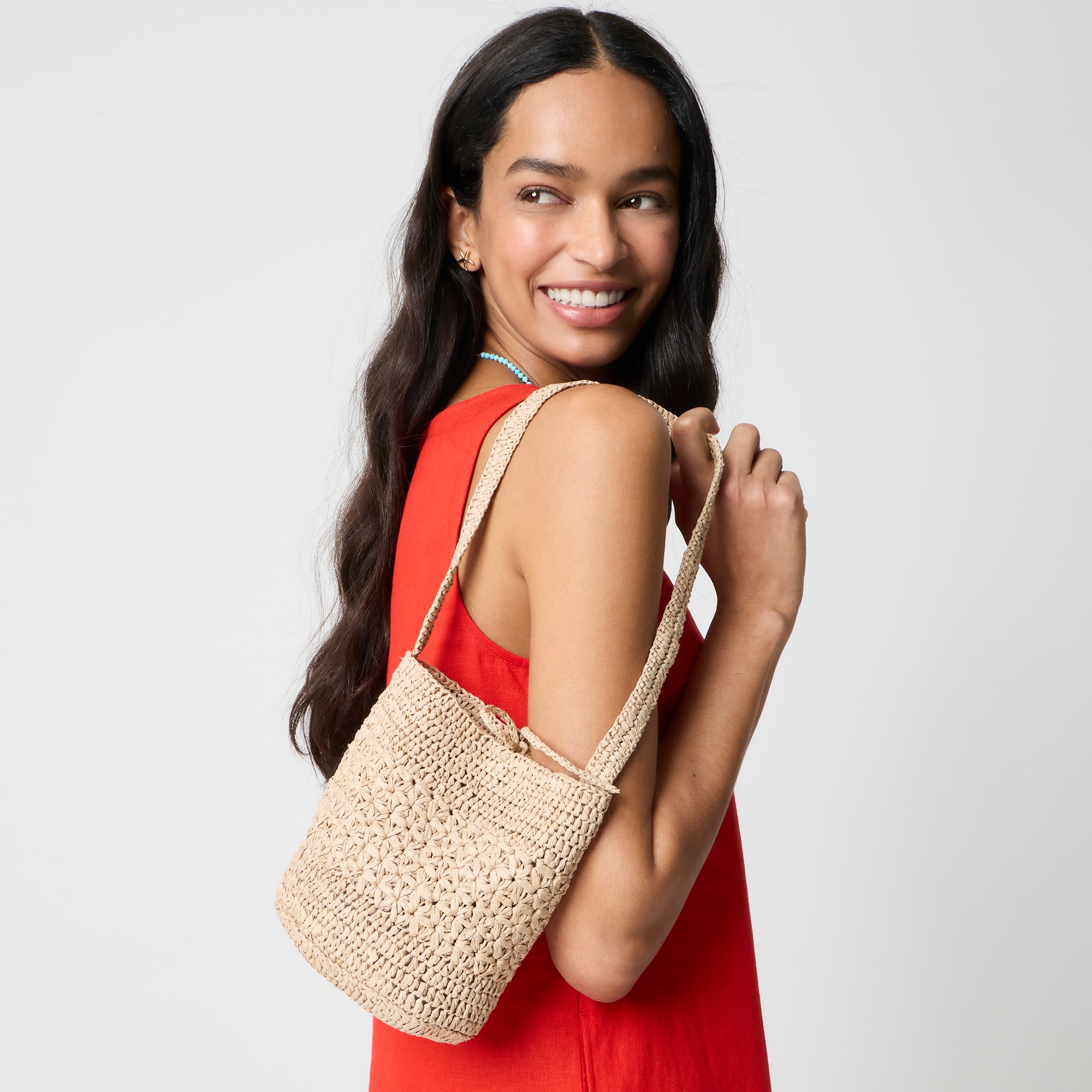 Floral woven bucket bag
